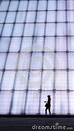 Young Girl Walking by Chongqing Grand theater at night Editorial Stock Photo